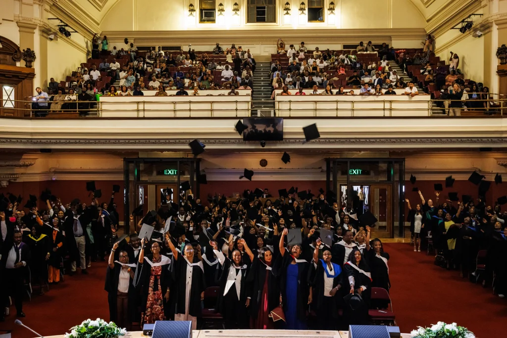 Graduates celebrating at the end of the LCPS ceremony